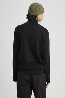 Pull col roulé