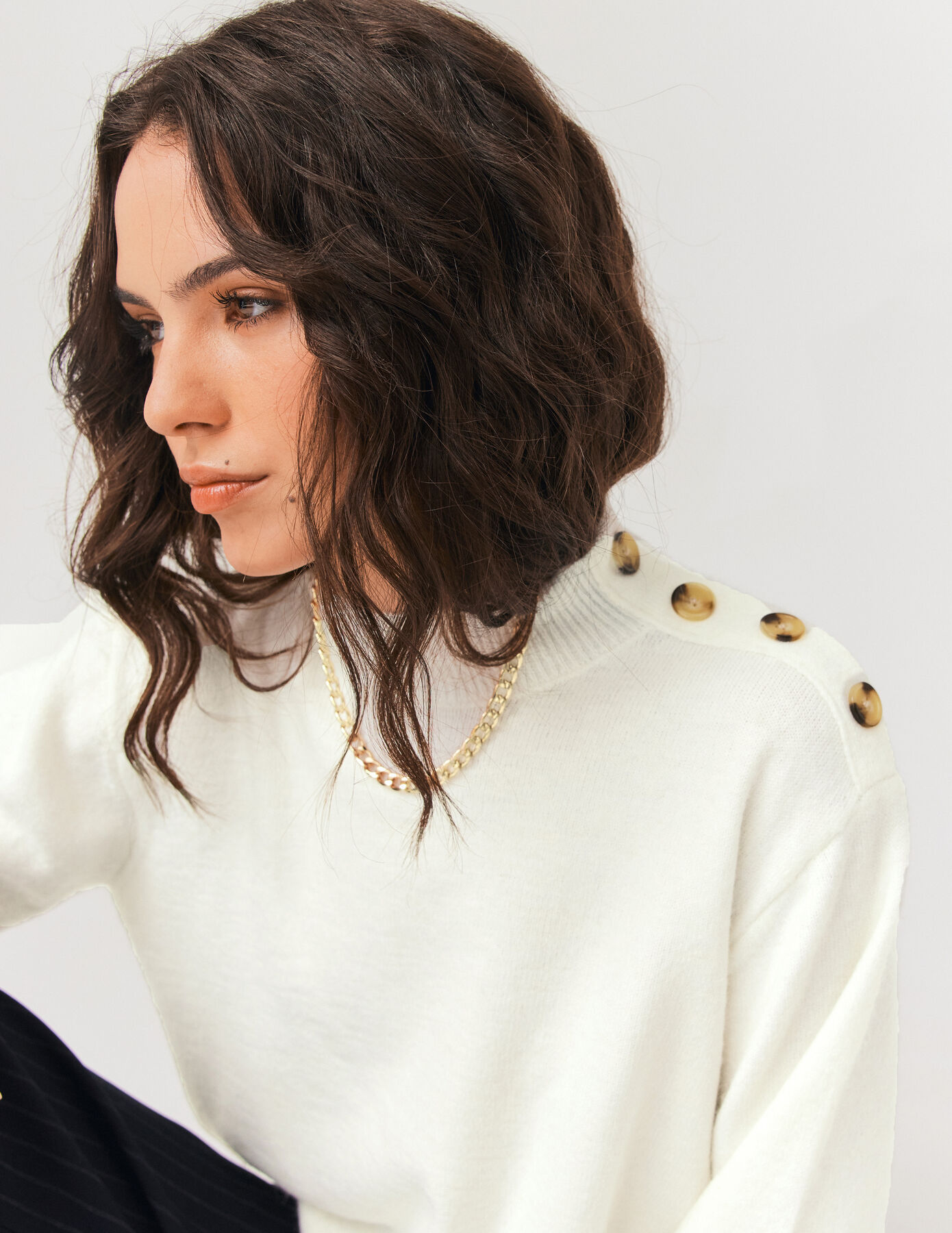 Pull boutons épaule