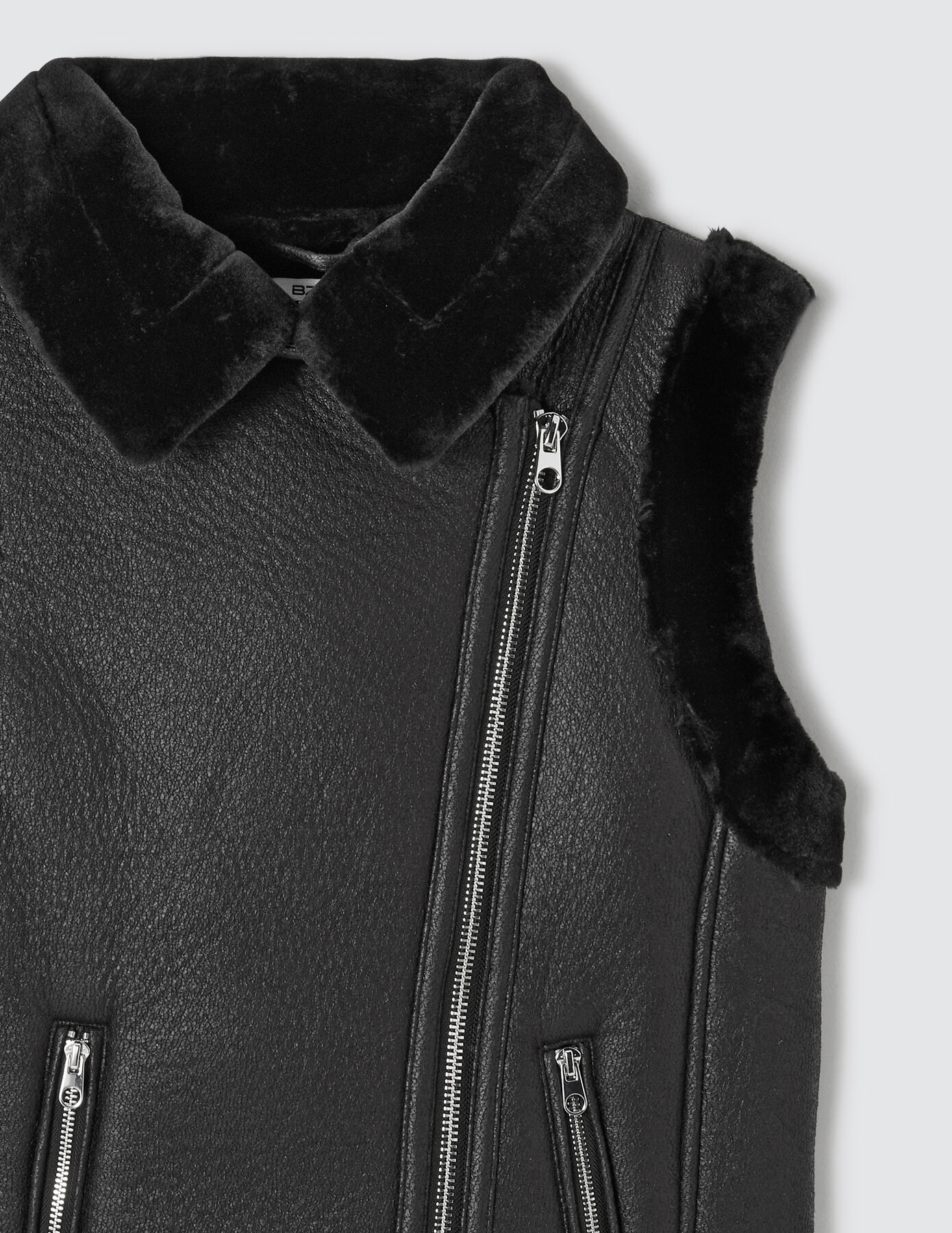 Blouson double face sans manches
