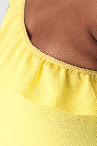 Maillot de bain 1 pièce asymétrique à volant uni