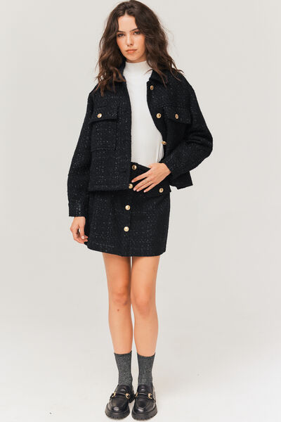 Jupe courte en tweed boutons dorés