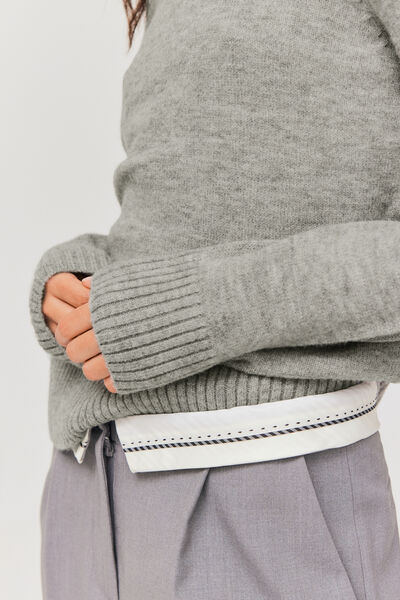 Pull col roulé uni