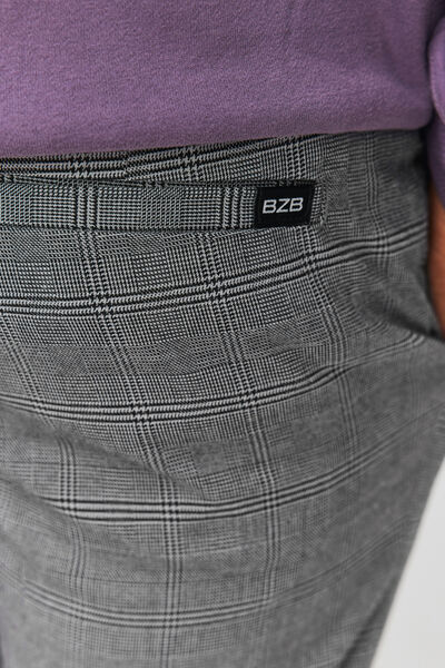 Pantalon urbain à carreaux taille élastiquée