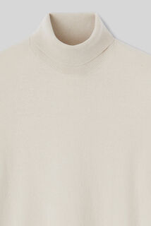 Pull col roulé