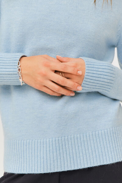 Pull col roulé uni