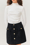 Jupe courte en tweed boutons dorés