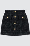 Jupe courte en tweed boutons dorés