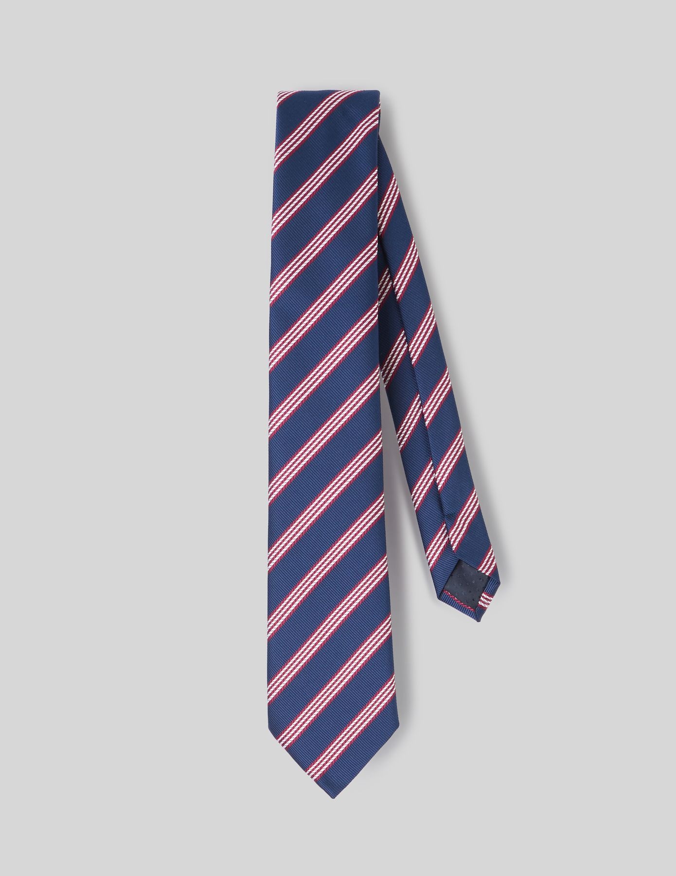 Cravate bleu marine avec rayures diagonales roses et rouges élégante