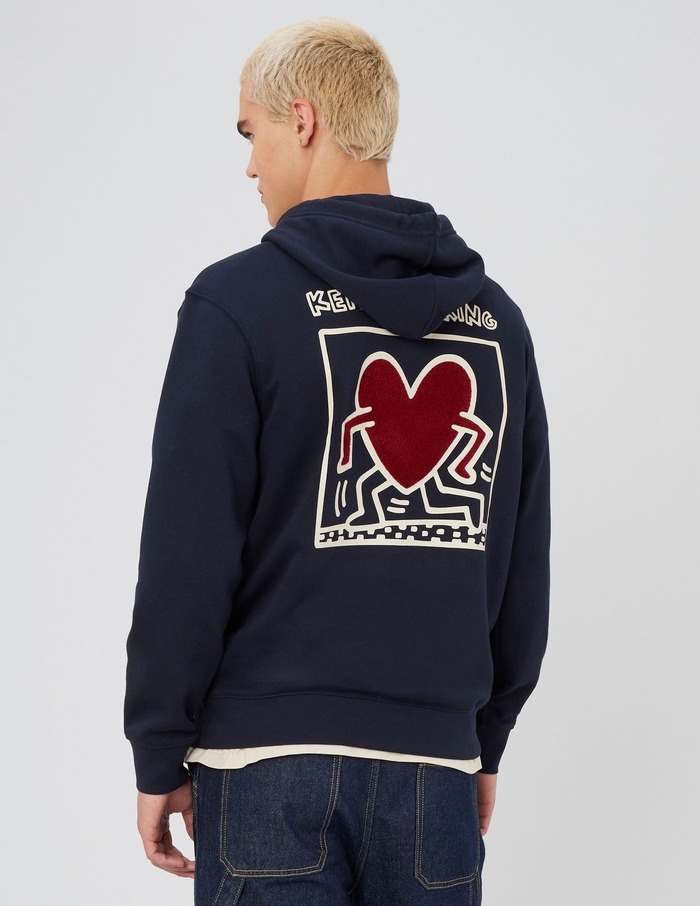 Look sportswear homme avec sweat à capuche marine à demi-zip et détails orange