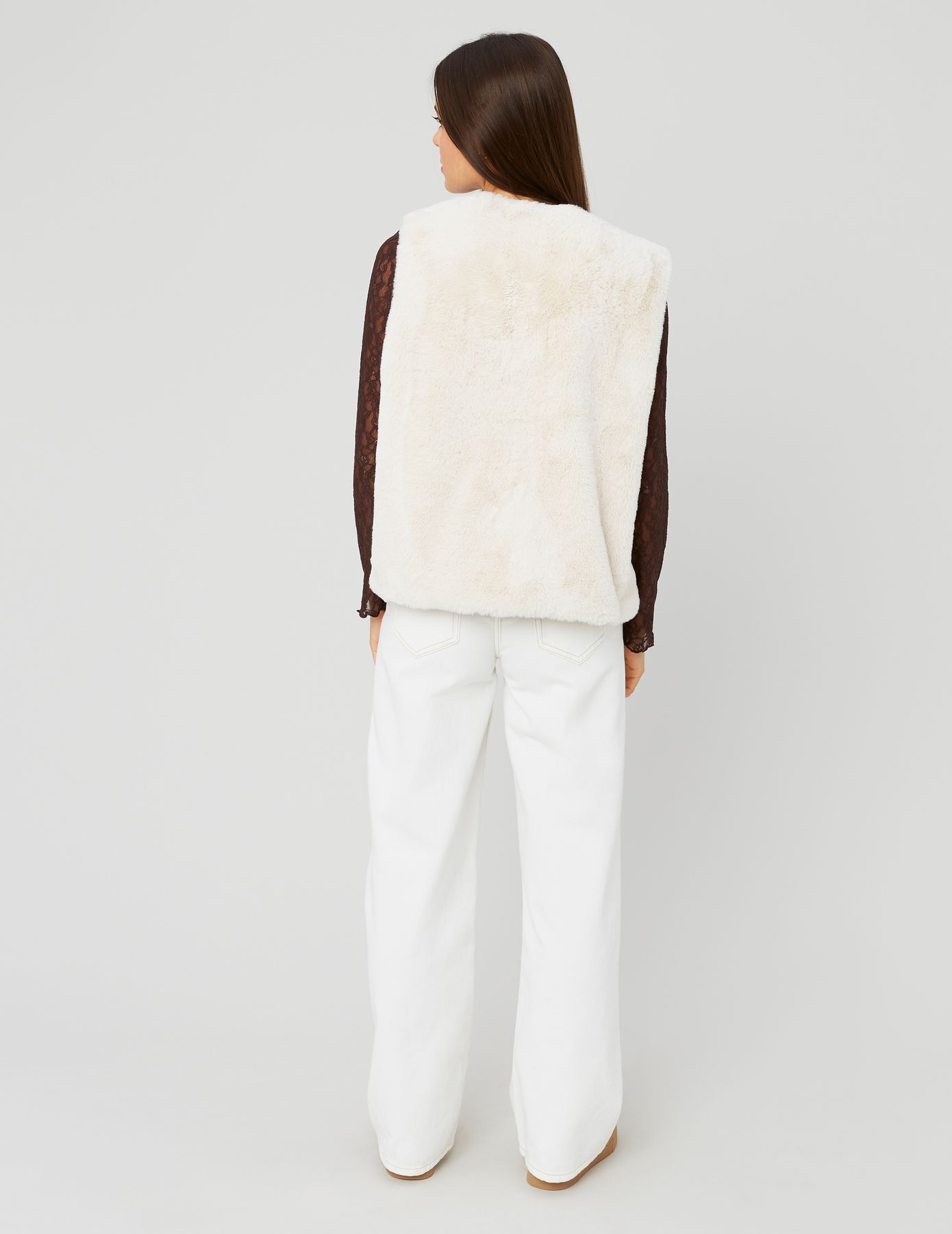 Veste matière duveteuse sans manches