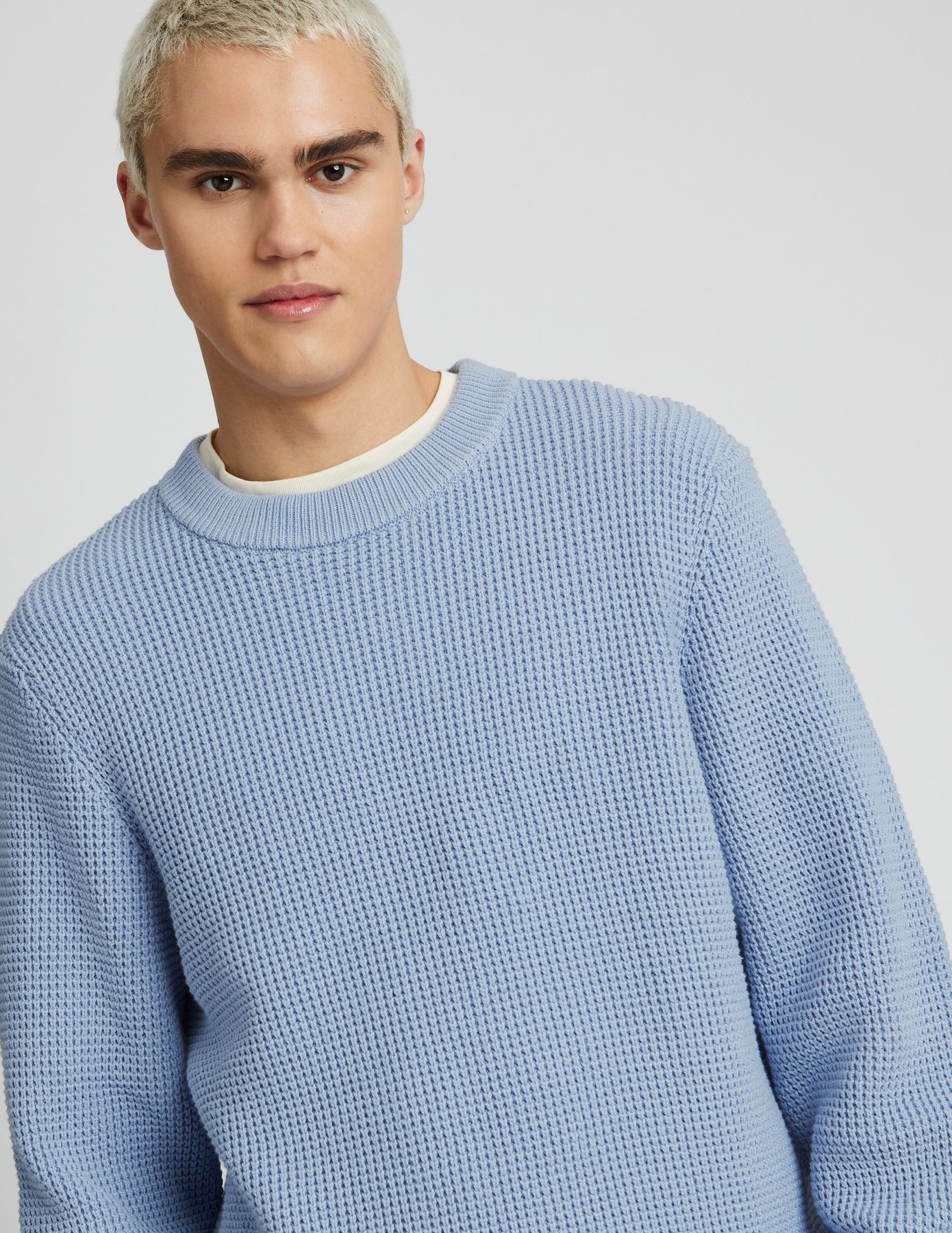 Pull col rond matière fantaisie