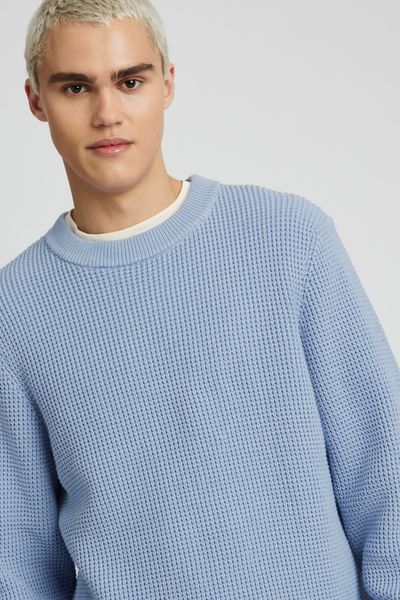 Pull col rond matière fantaisie