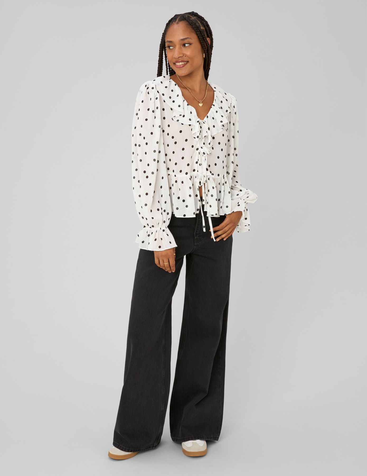 Blouse &agrave; volants motif pois