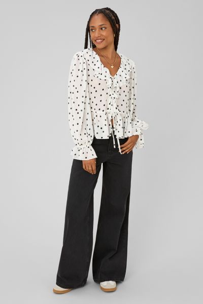 Blouse &agrave; volants motif pois