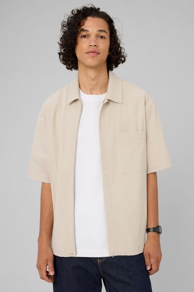 Chemise zipp&eacute;e manches courtes