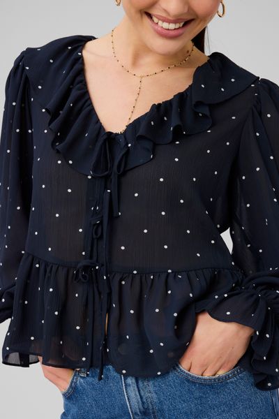 Blouse &agrave; volants motif pois