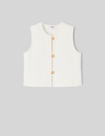 Top avec d&eacute;tails de boutons dor&eacute;s