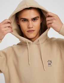 Sweat brodé à capuche