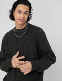 Pull col rond matière fantaisie