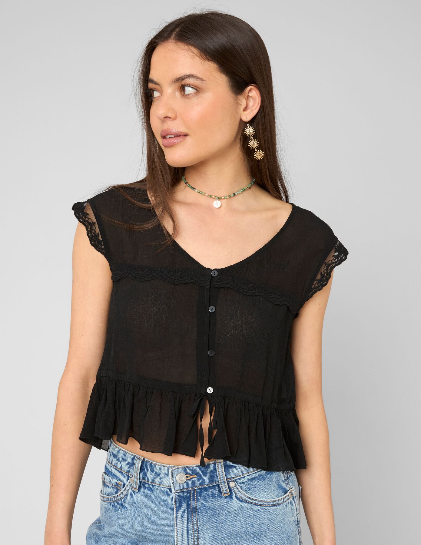 Blouse sans manches &agrave; volants