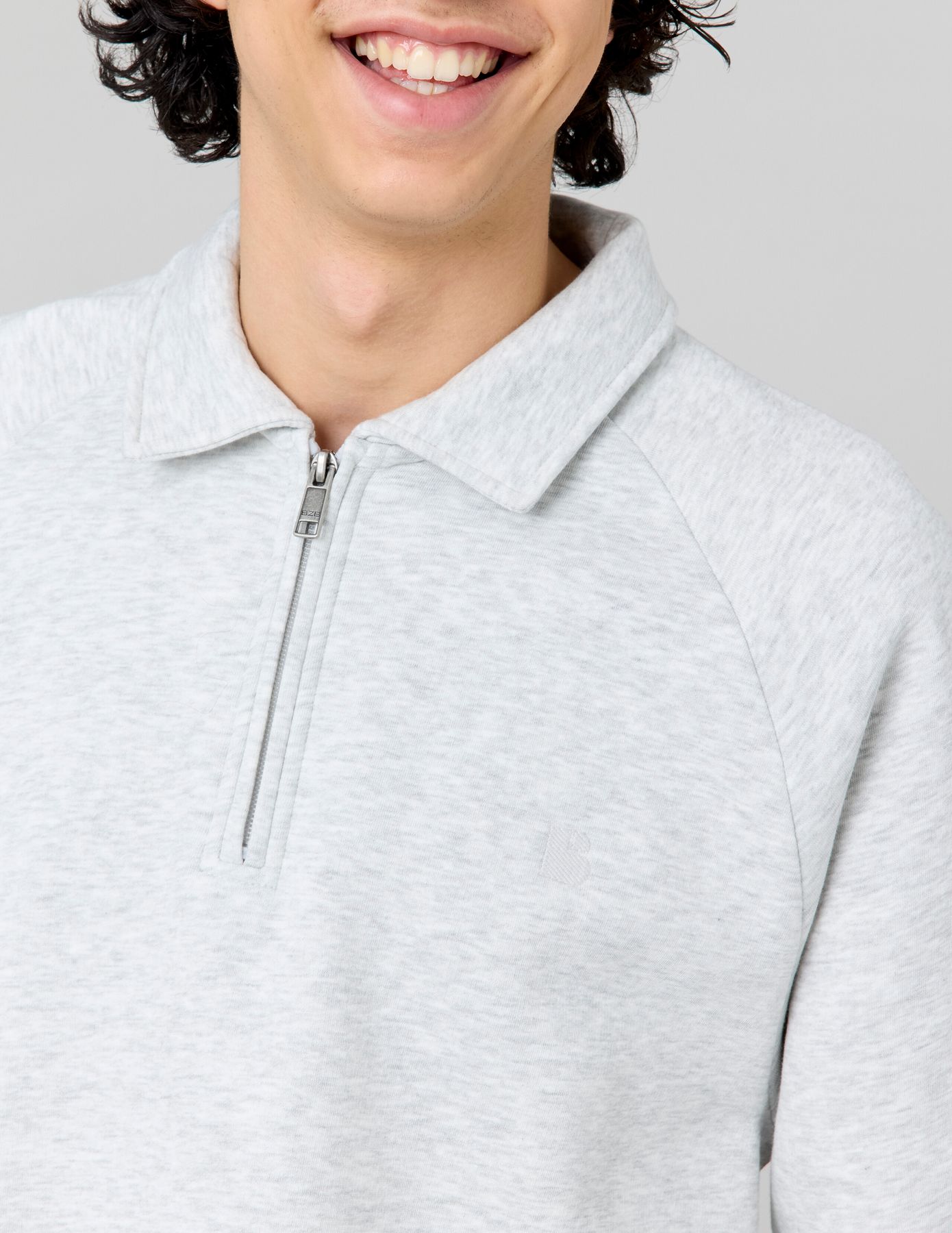 Sweat col polo zippé