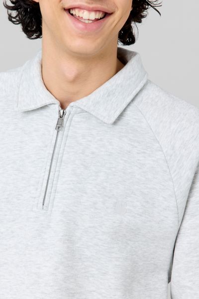 Sweat col polo zippé