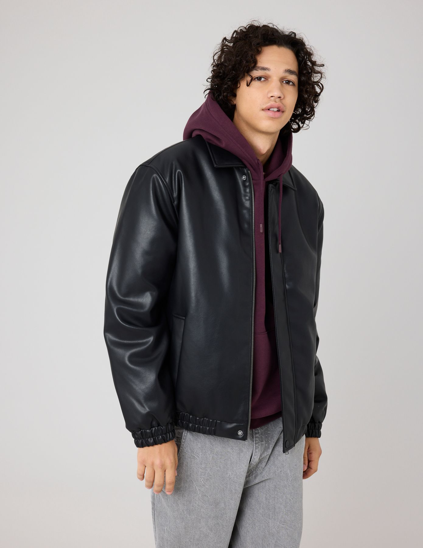 Blouson zippé en tissu enduit