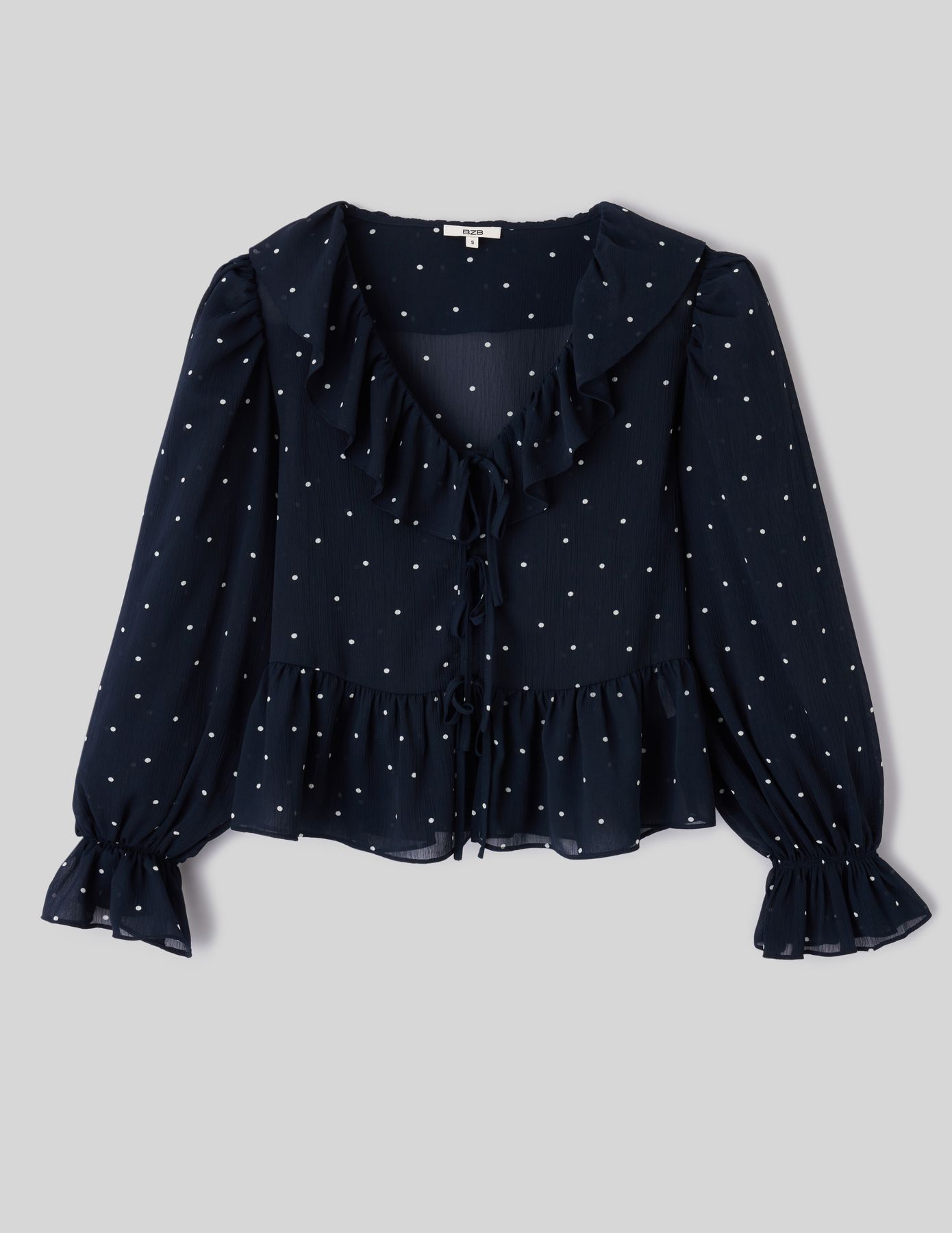 Blouse &agrave; volants motif pois