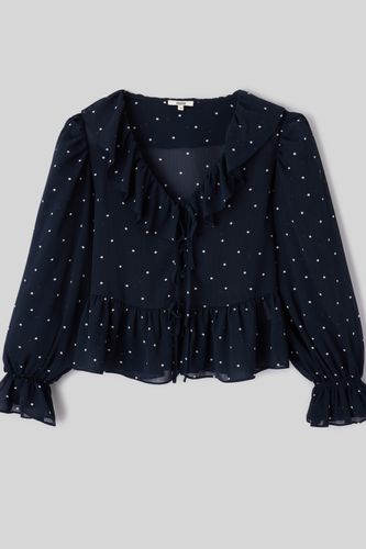 Blouse &agrave; volants motif pois