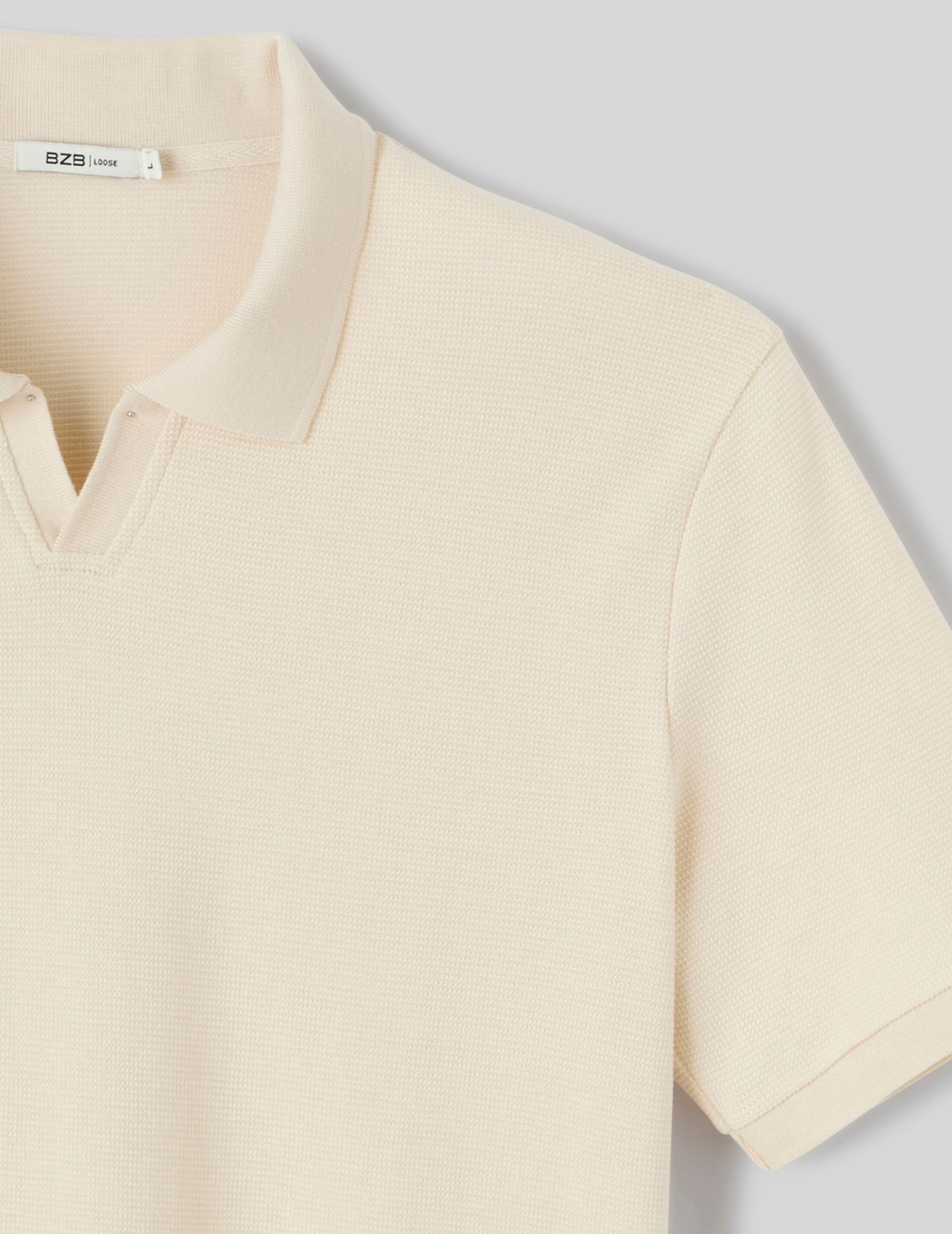 Polo matière fantaisie