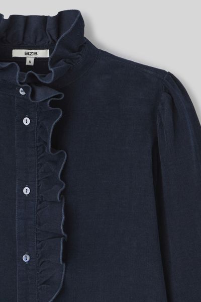 Blouse col montant en velours côtelé