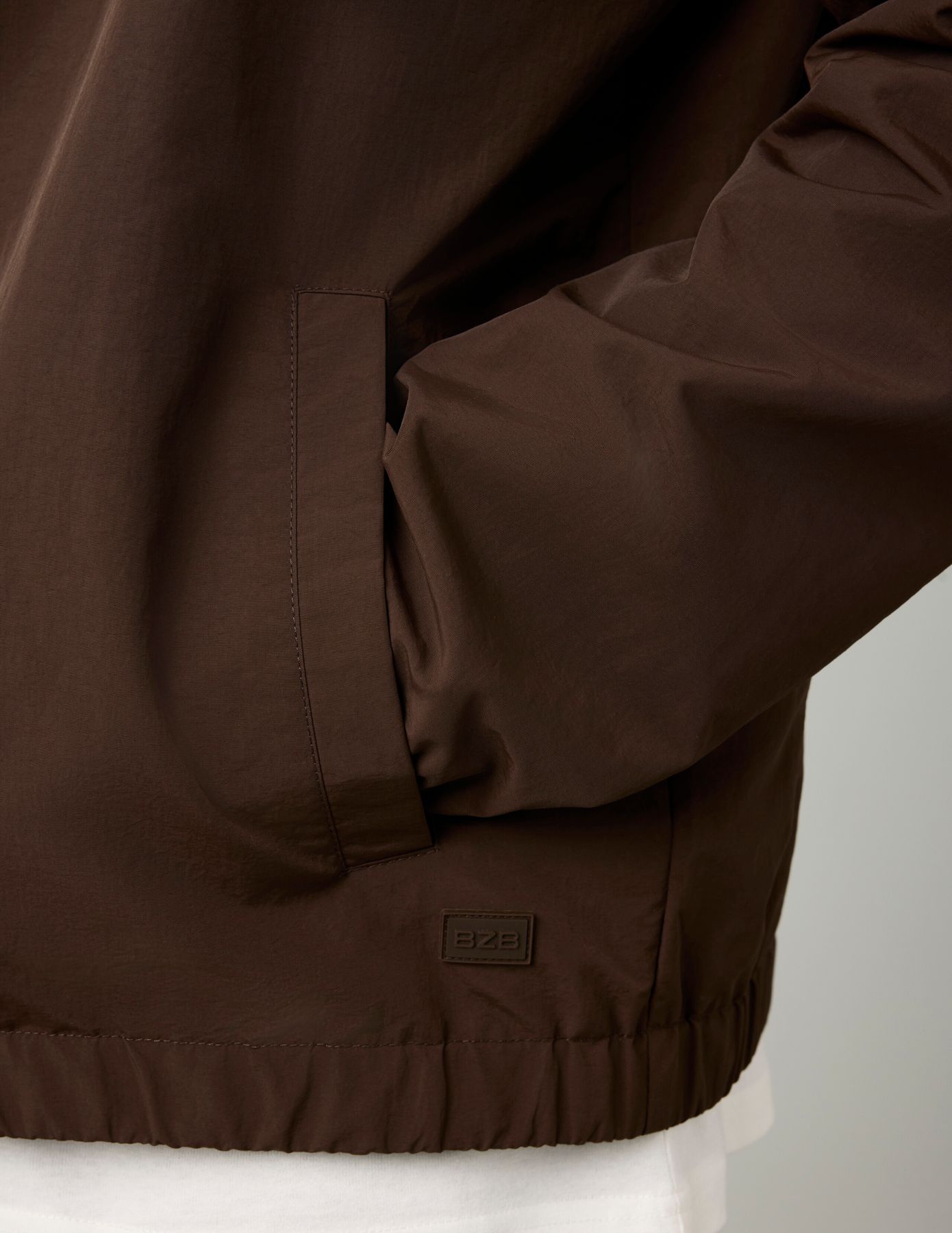 Blouson léger à capuche