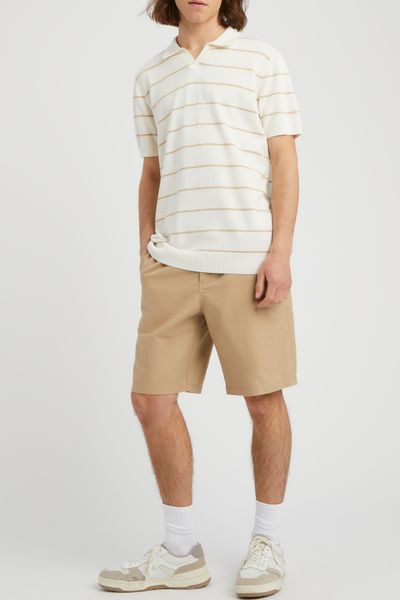 Polo ray&eacute;