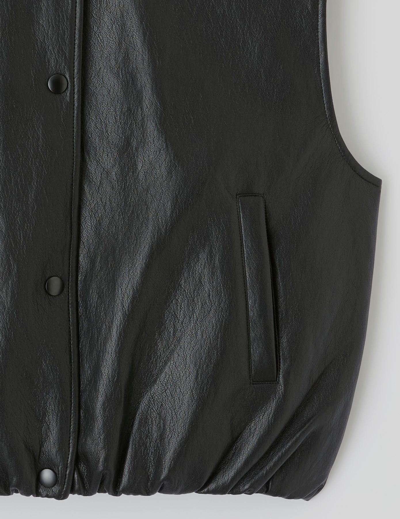 Gilet sans manches en tissu enduit