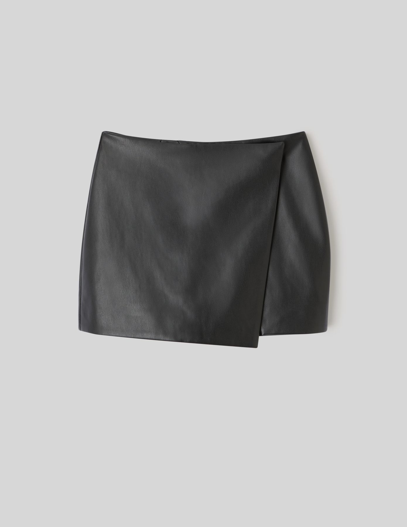 Jupe short en tissu enduit