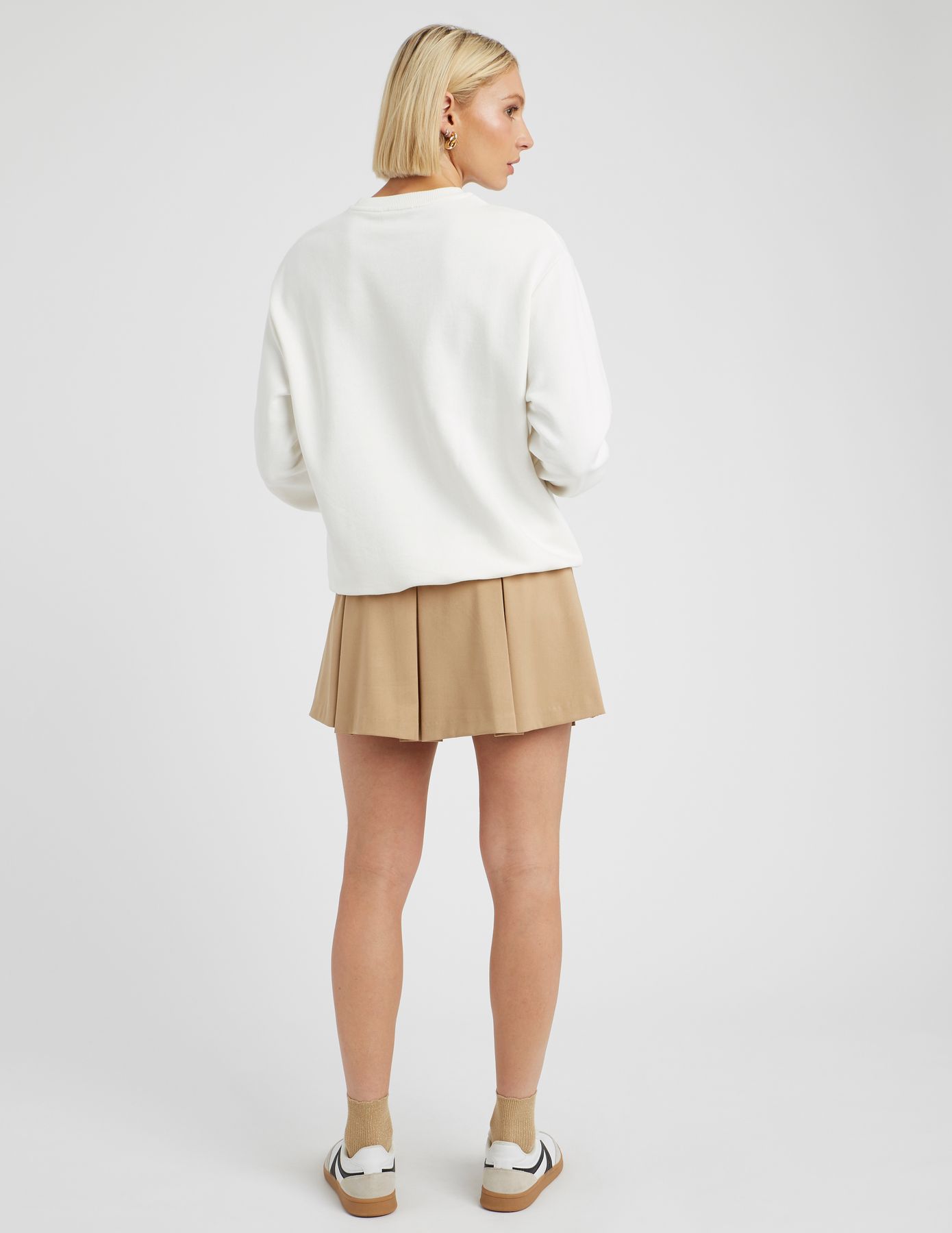 Jupe short à plis plats
