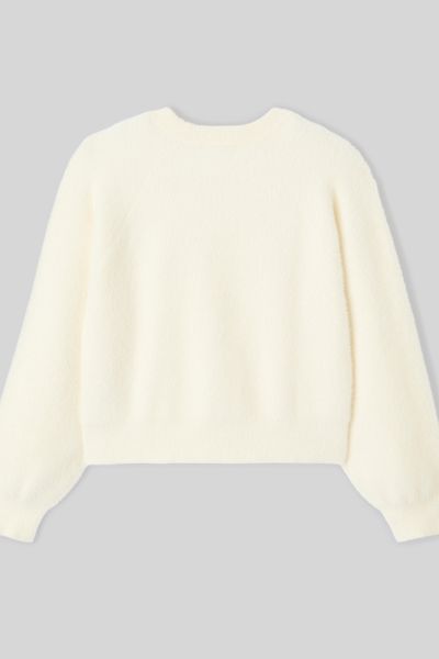 Pull fluffy boutons bijoux