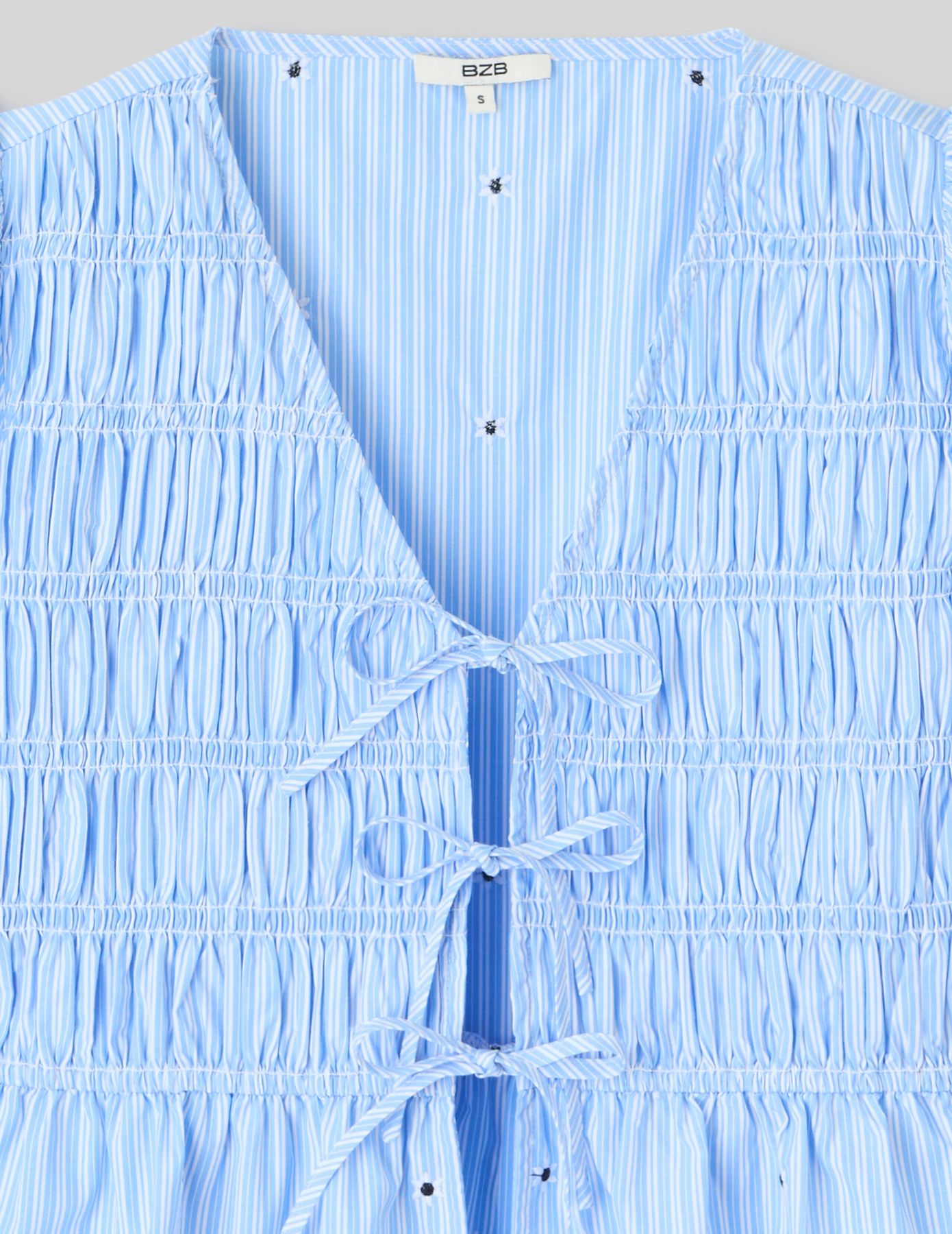 Blouse &agrave; nouer motif ray&eacute;