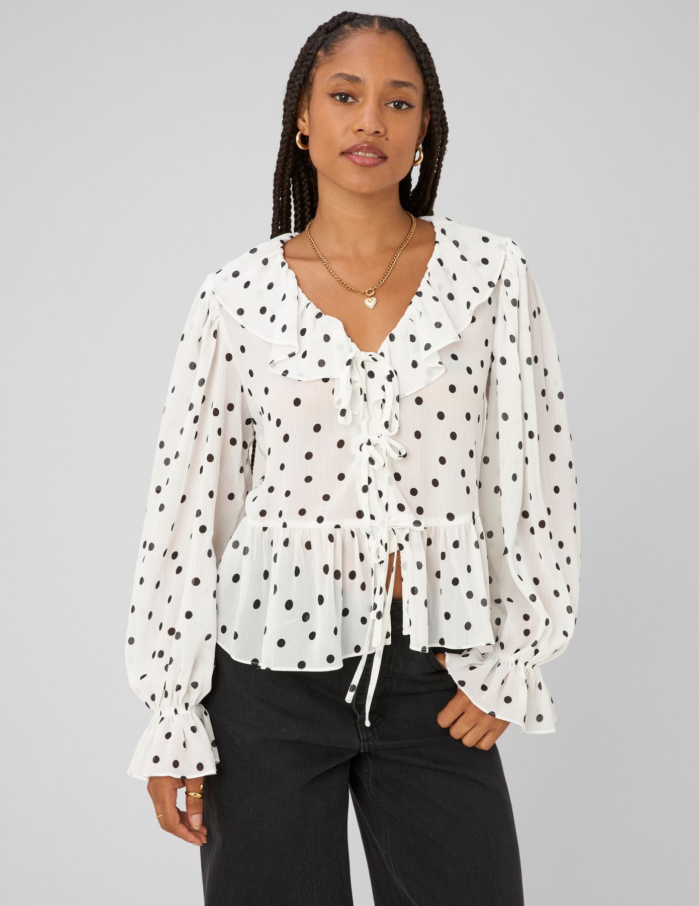 Blouse &agrave; volants motif pois