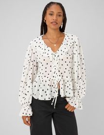 Blouse &agrave; volants motif pois