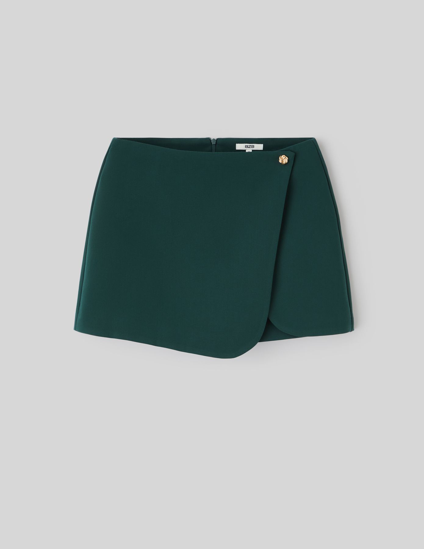 Jupe short portefeuille avec bouton dor&eacute;