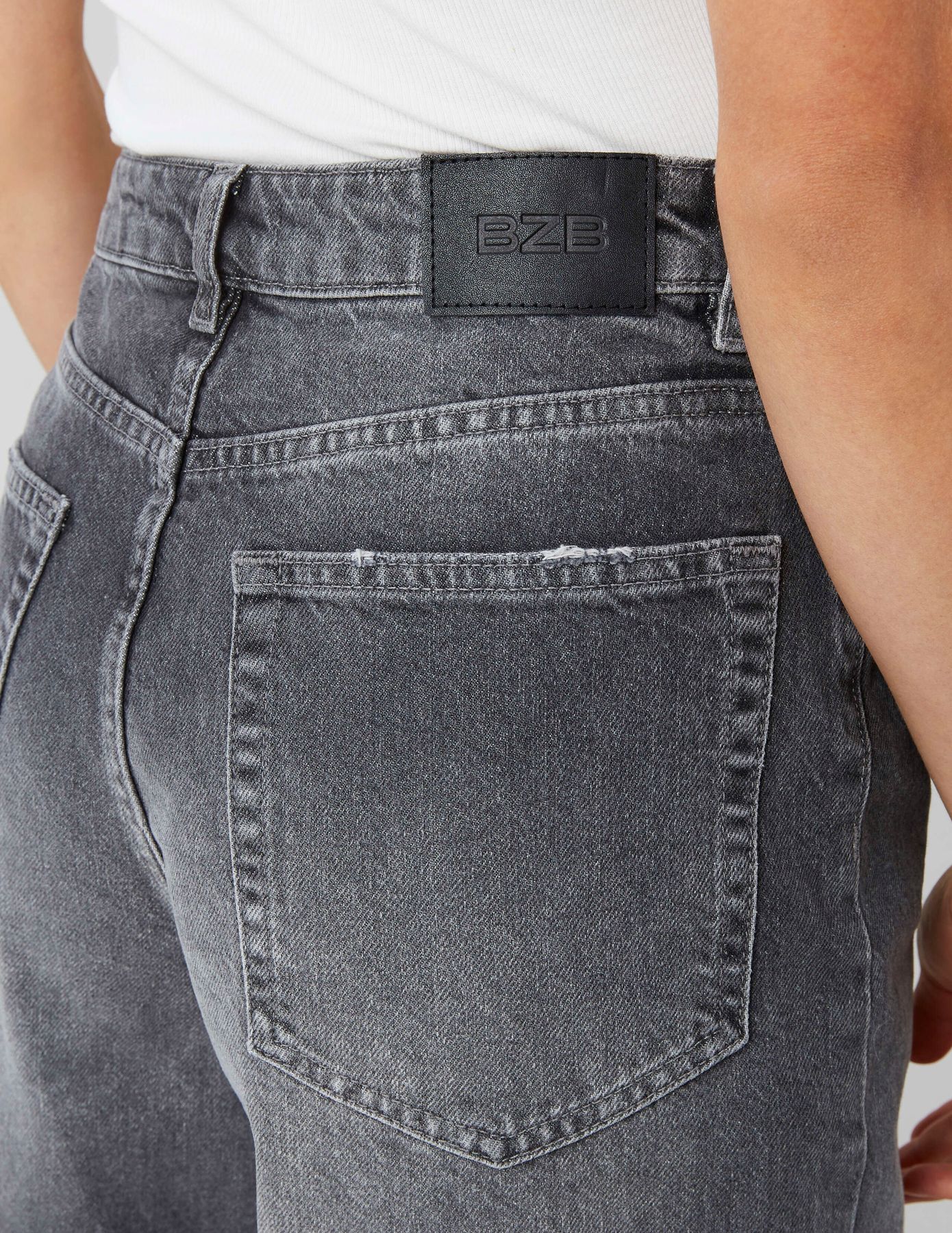 Jean wide leg ceinture asym&eacute;trique