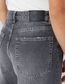 Jean wide leg ceinture asym&eacute;trique