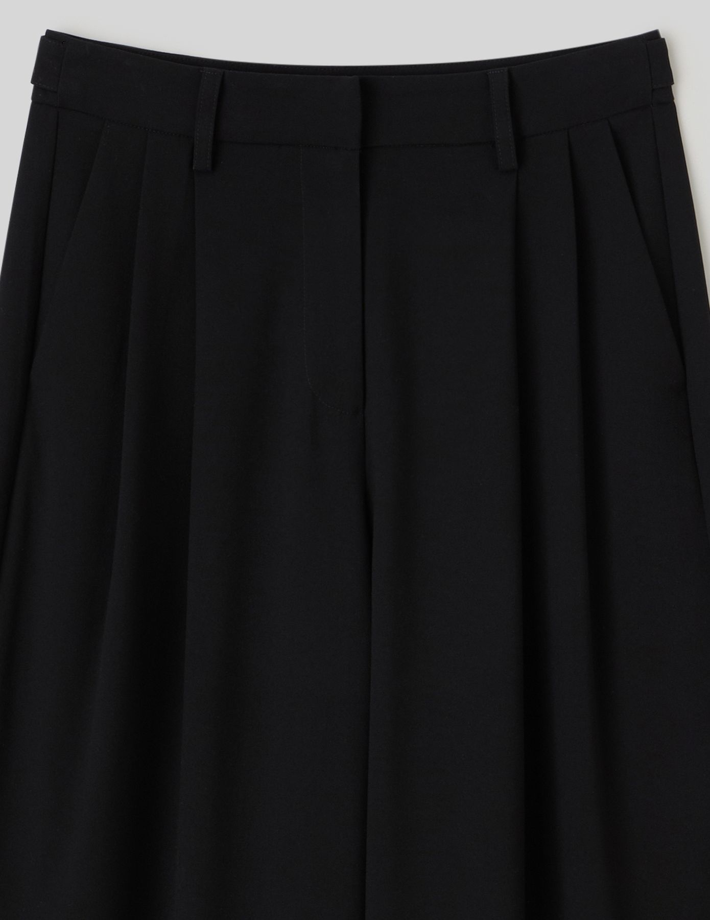 Pantalon à pince ajustable