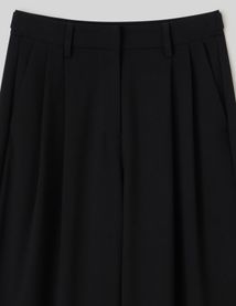 Pantalon à pince ajustable