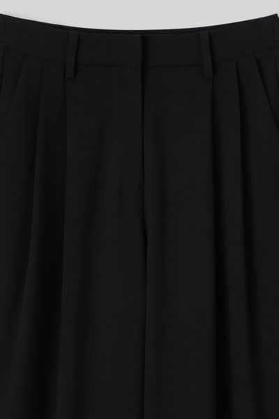 Pantalon à pince ajustable