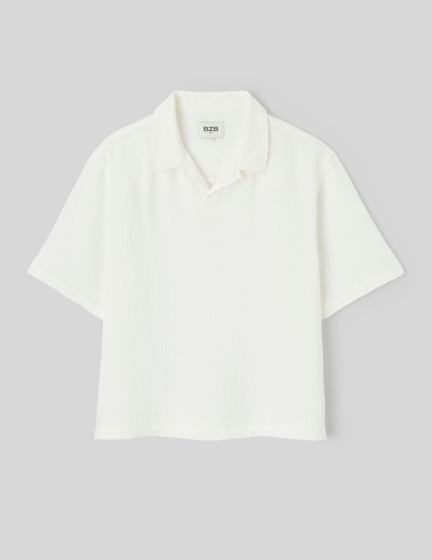 Polo en mati&egrave;re textur&eacute;e