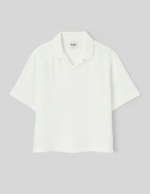 Polo en mati&egrave;re textur&eacute;e