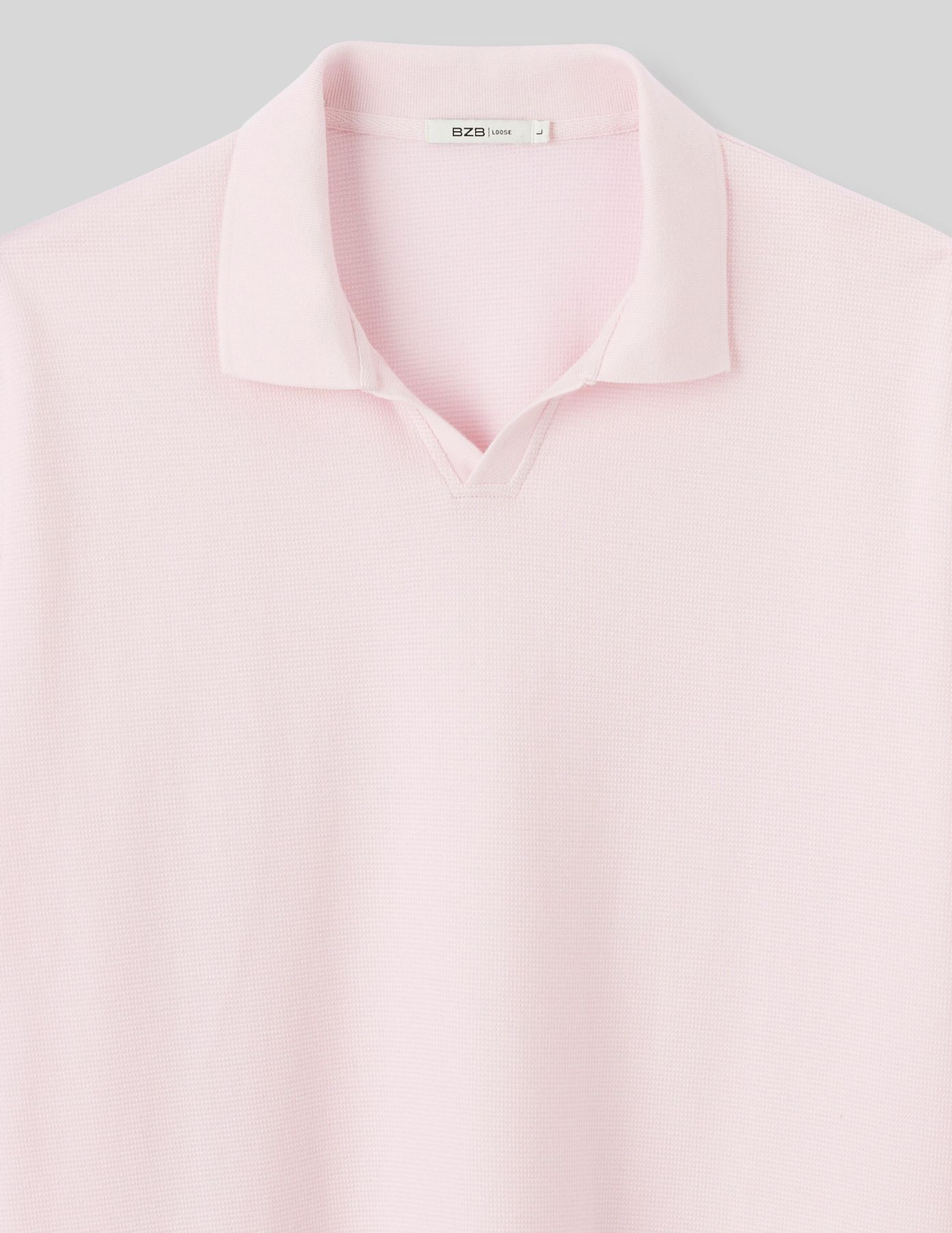 Polo matière fantaisie