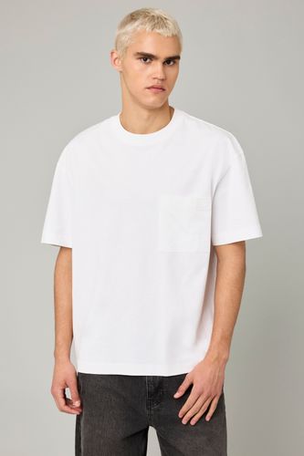 T-shirt boxy poche